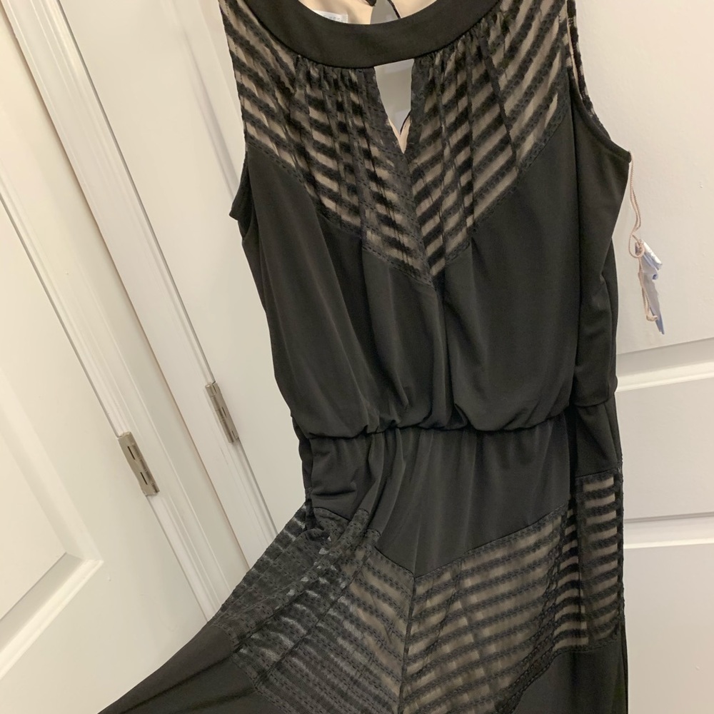 Sleeveless High Neck Peephole Maxi